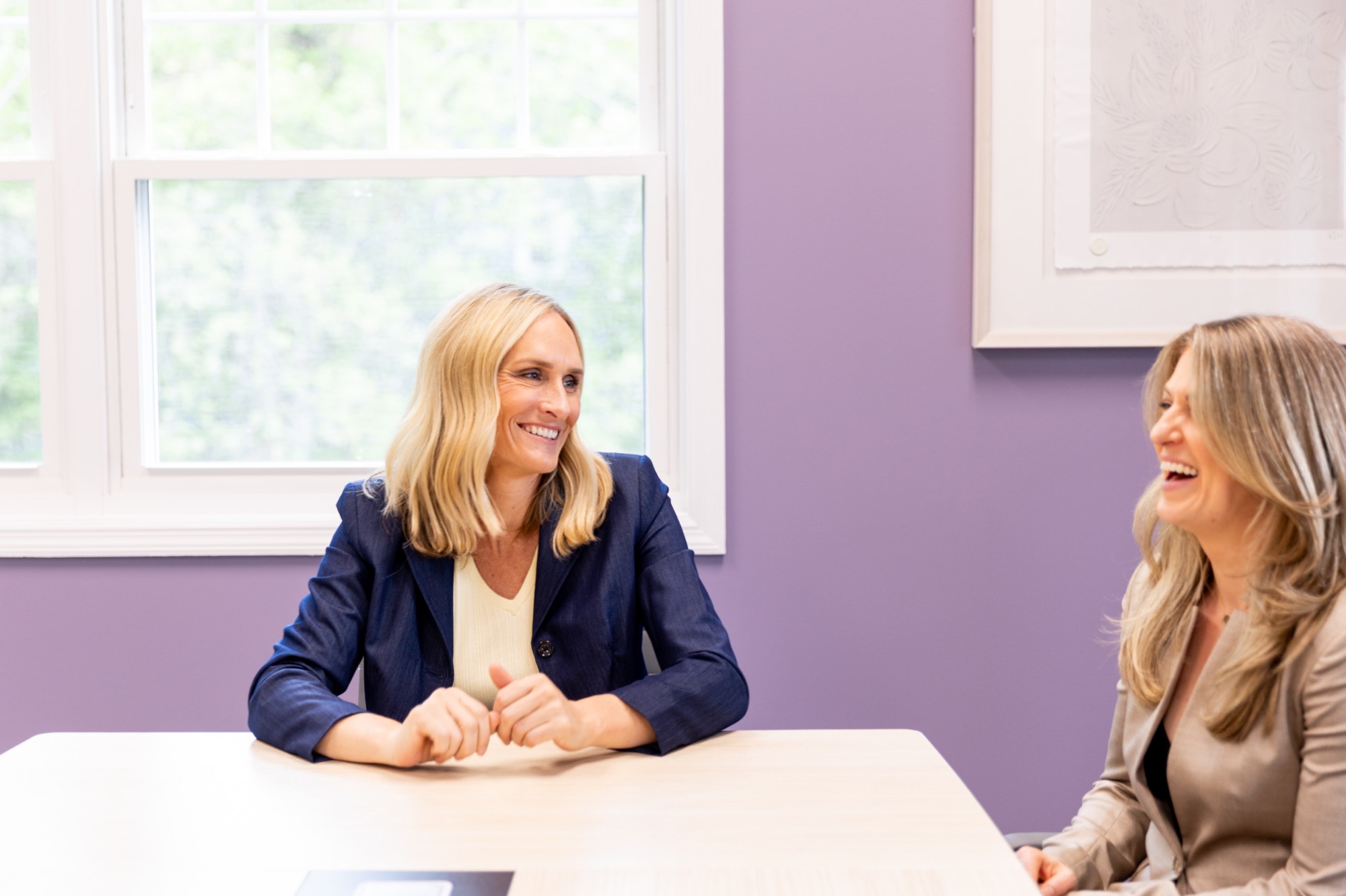 Laughing together during a meeting