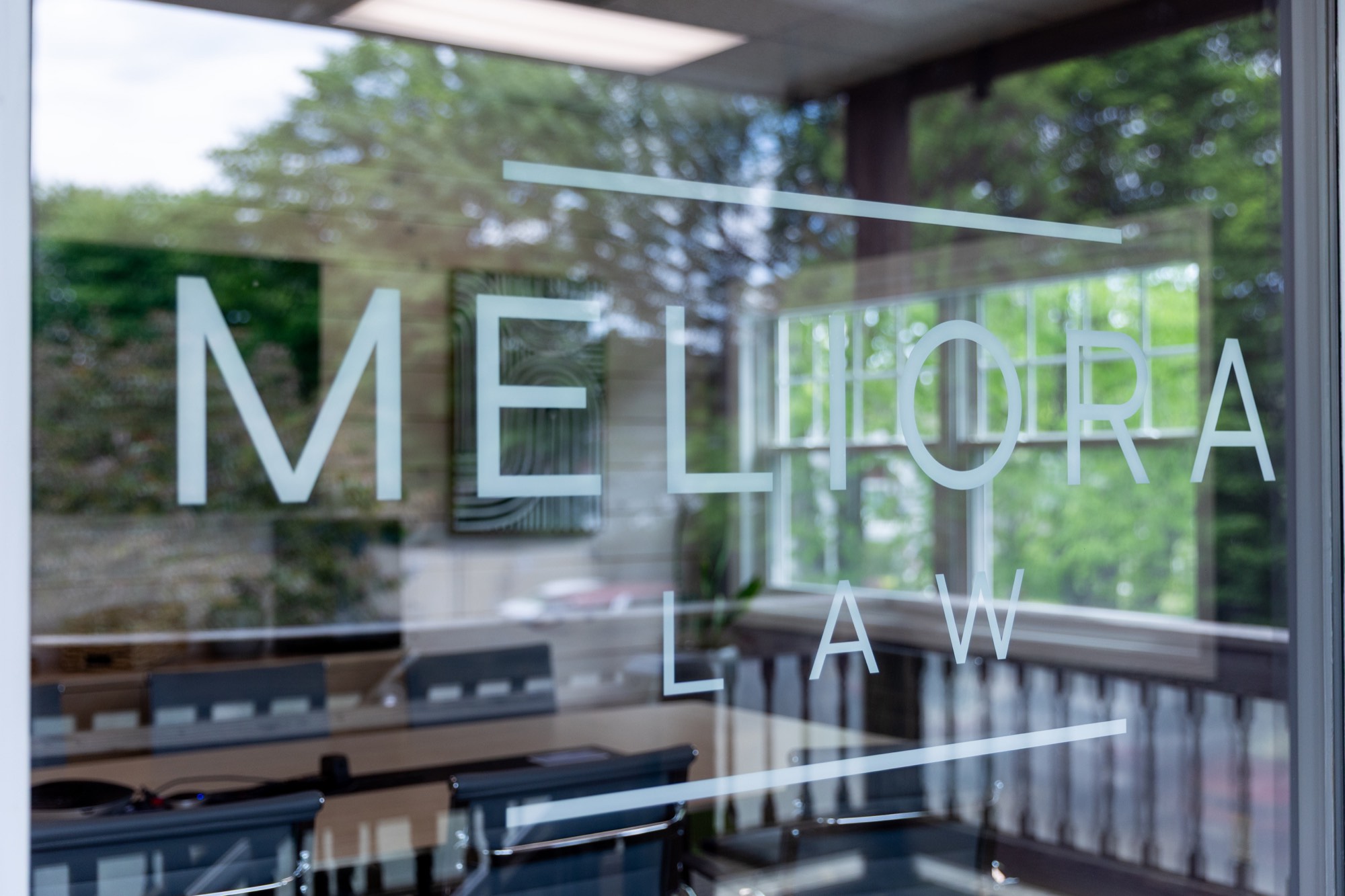 Meliora Law lettering on the office glass